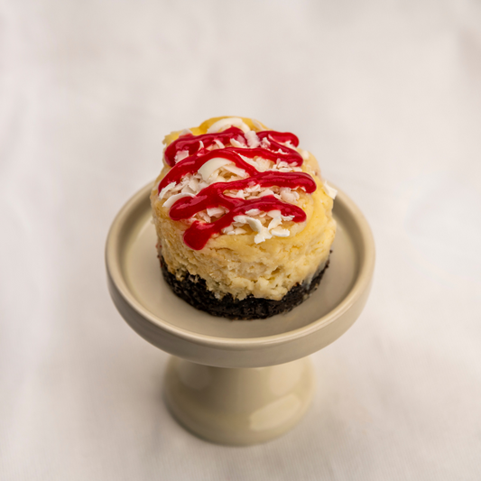 Mini cheesecake au chocolat blanc et aux framboises
